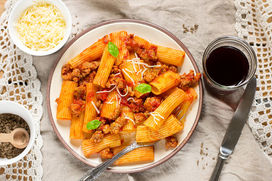 Pasta rigatoni in bolognese sauce with ground meat