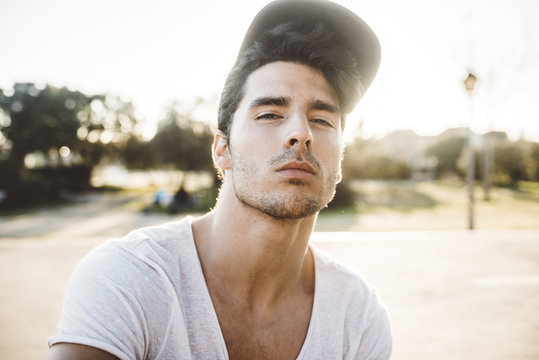 Portrait of young man posing outdoors