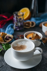 spring breakfast with muffins in rustic style