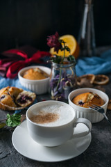 spring breakfast with muffins in rustic style