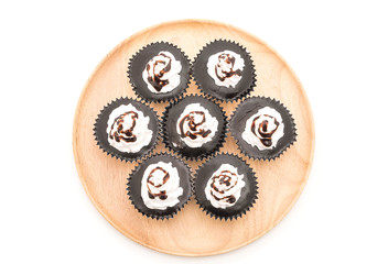 chocolate cup cake with whipped cream