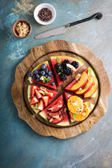 Watermelon pizza with various fruts