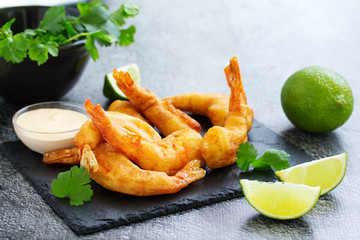 Shrimp fried in batter with sauce.