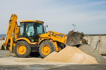 Excavator in the town