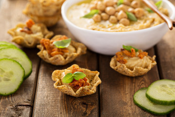 Homemade hummus in tortilla bowls