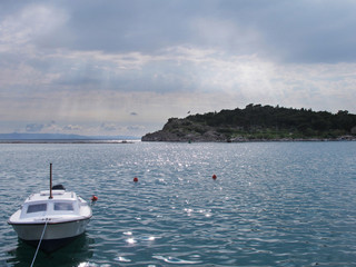 Obraz premium summer view of a boat and island in Croatia