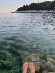 woman feet on the Adriatic sea in Croatia