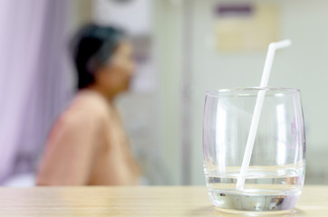 A patient has drinking water.