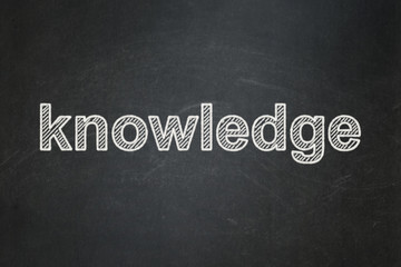 Obraz premium Education concept: Knowledge on chalkboard background