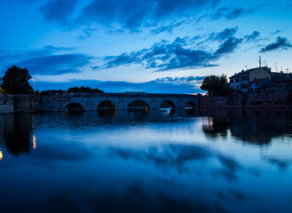 The Bridge of Tiberius in Rimini at sunset