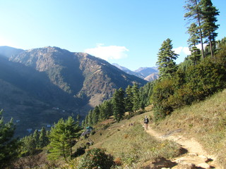 A traveler on a mountain trail