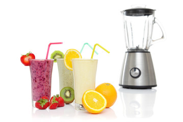 Healthy Smoothies with fresh fruits and a Blender isolated on white, for a good fit start in your day