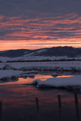 A sunset reflection in winter.