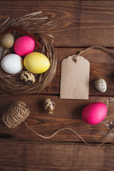 Easter eggs  on rustic wooden  background . Easter greeting card