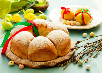 Traditional Easter cakes with colored eggs.