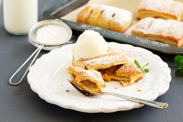Homemade cakes and puff pastry with apples and caramel.
