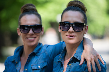 twin sister with sunglasses