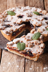 Delicious pie with plum jam closeup. vertical