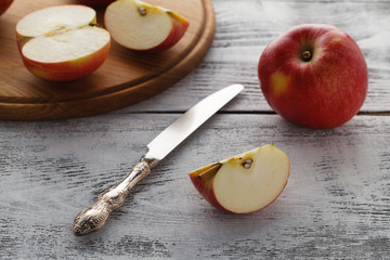 Vegaterian breakfast sliced red apples on table