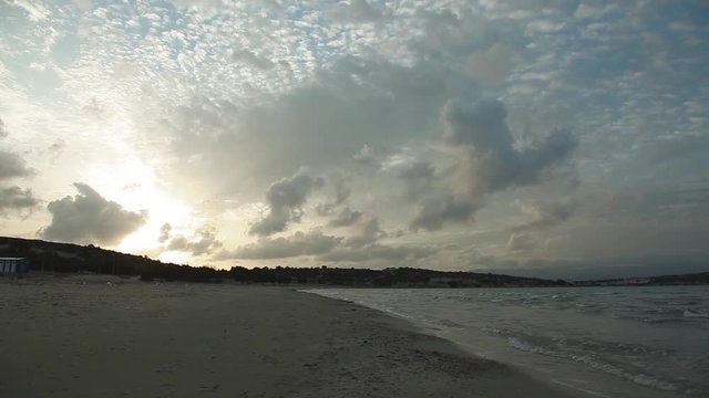 polluted beach on a windy day