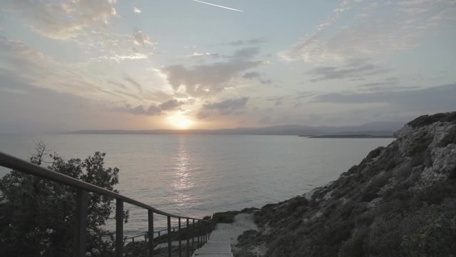 watching the sunset from a coastline