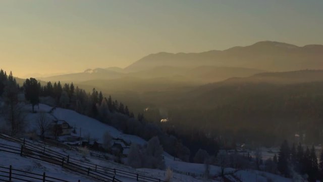 Dawn fog village winter forest