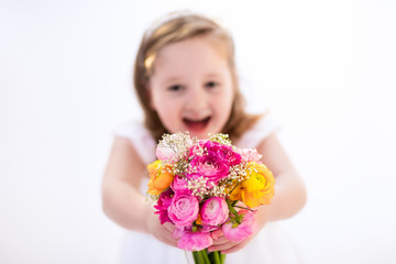 Little girl with flower bouquet