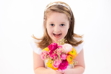 Little girl with flower bouquet