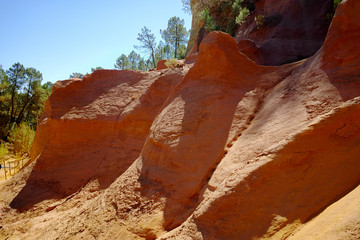 Orange ochre pigment picturesque hills. Roussillon, Provence, France.