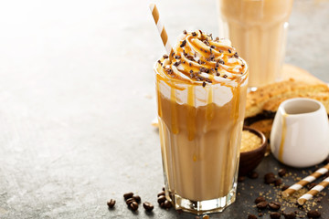 Iced caramel latte coffee in a tall glass