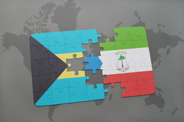 puzzle with the national flag of bahamas and equatorial guinea on a world map