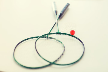 close up of badminton rackets with shuttlecock