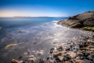 Fototapeta na wymiar Scenic blue beach with clear sea waters at Germasogia, Limassol Cyprus