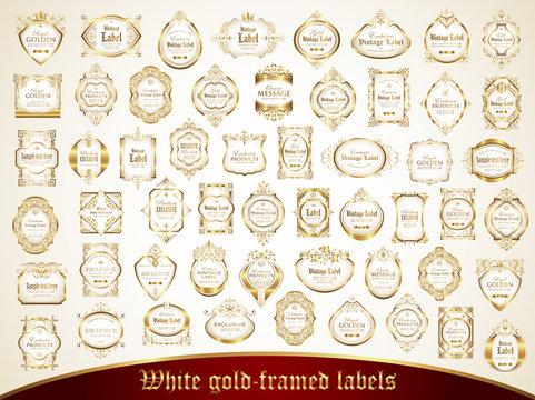 Large collection of white gold-framed labels in vintage style