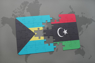 puzzle with the national flag of bahamas and libya on a world map