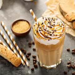 Iced caramel latte coffee in a tall glass