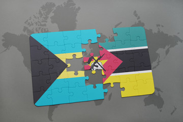 puzzle with the national flag of bahamas and mozambique on a world map