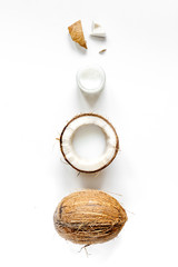organic cosmetics with coconut on white background top view
