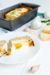 Meat rolls with eggs on a white background