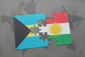 puzzle with the national flag of bahamas and kurdistan on a world map