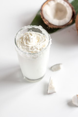 cocktail with coconut on white background