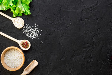 Fototapeta na wymiar ingredients for paella on dark background top view