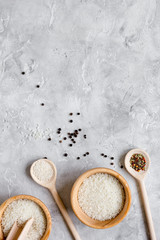 rice for paella on stone background top view mock up