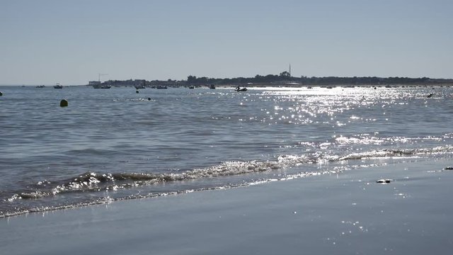 Slow motion ocean scenery with natural sun reflections 1920X1080 HD footage - Early mor