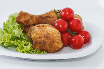 Fried chicken pieces.