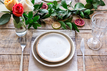 ceramic tableware top view on wooden background mock up