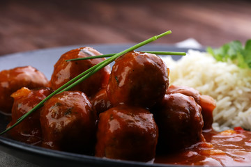 Delicious meatballs made from ground beef in a spicy tomato sauce