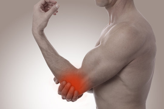 Sport injury, Man with elbow pain. Pain relief concept.