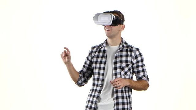 Man works with files in virtual reality glasses. White background