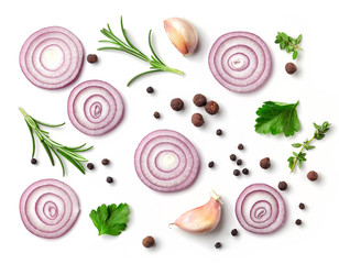 red onion and spices on white background